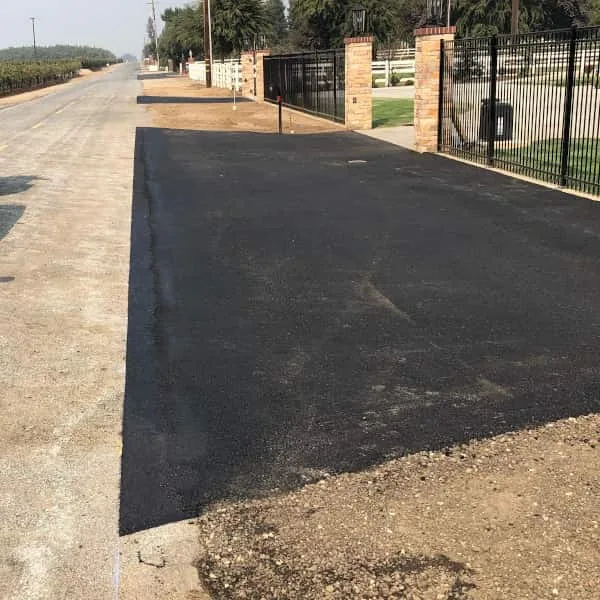 Driveway with new asphalt apron