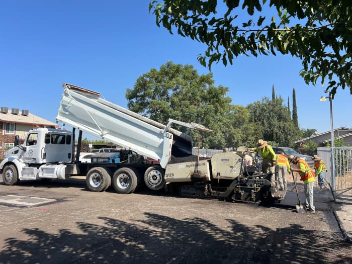 Evergreen Care Center parking lot being paved