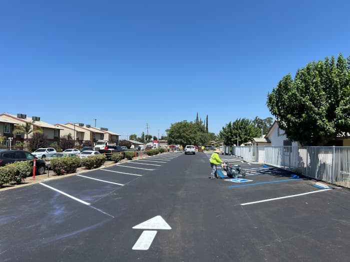 Parking lot being striped. 