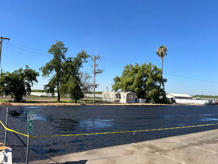 Wet oil on new parking lot install